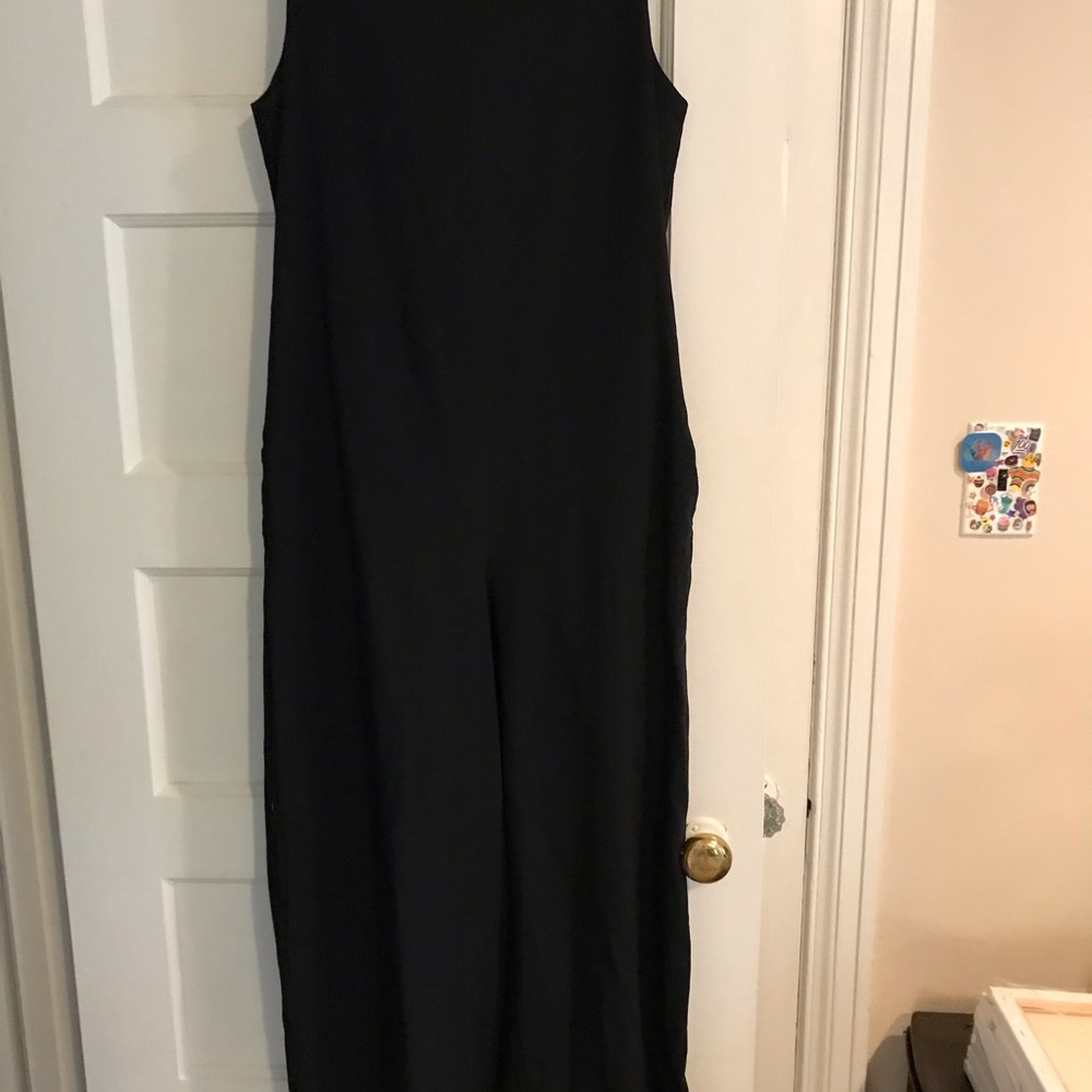 Black sleeveless flowy legged jumpsuit